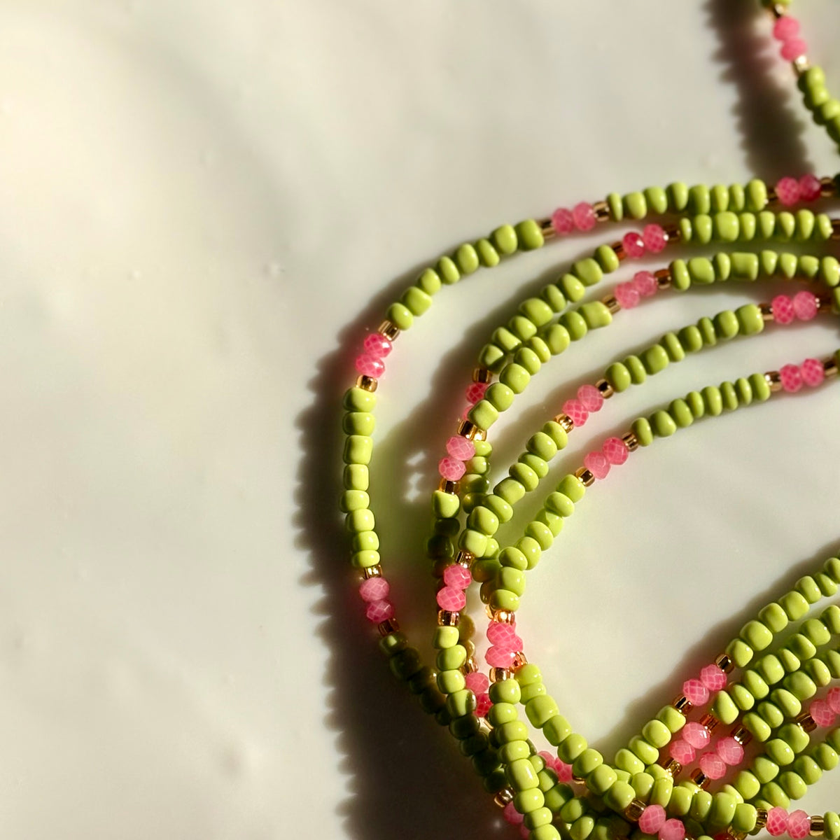 Strawberry Shortcake waist beads by Avionna Naturals, detail view 2